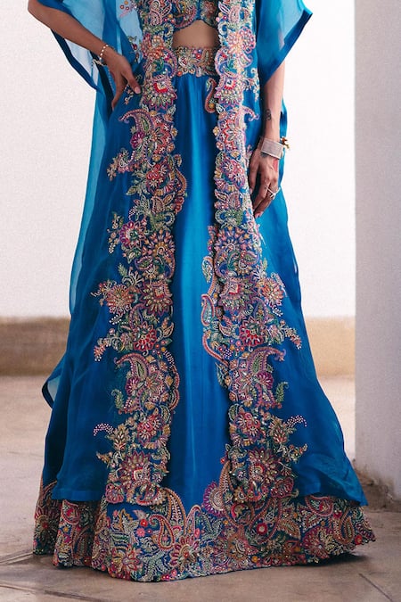 Mrunalini Rao Blue Silk Embroidery, Pearls, Zari Plunge Neck Ekam Cape Lehenga Set Online at Aza Fashions Mrunalini Rao_Blue Silk Embroidery, Pearls, Zari Plunge Neck Ekam Cape Lehenga Set _Online_at_Aza_Fashions