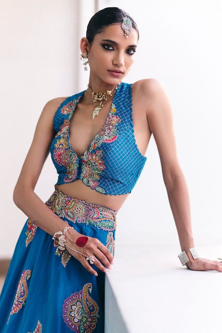 Mrunalini Rao Blue Silk Embroidery, Pearls, Zari Plunge Neck Ekam Cape Lehenga Set at Aza Fashions Mrunalini Rao_Blue Silk Embroidery, Pearls, Zari Plunge Neck Ekam Cape Lehenga Set _at_Aza_Fashions
