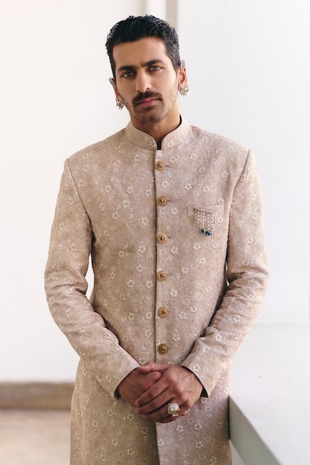 Shop Mrunalini Rao Beige Silk Embroidery Sambhuya Floral Sherwani Set at Aza Fashions Shop_Mrunalini Rao_Beige Silk Embroidery Sambhuya Floral Sherwani Set _at_Aza_Fashions