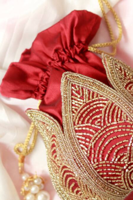 Shop_The Tan Clan_Maroon Cut Work, Beads Hasta Lotus Embroidered Potli _Online_at_Aza_Fashions