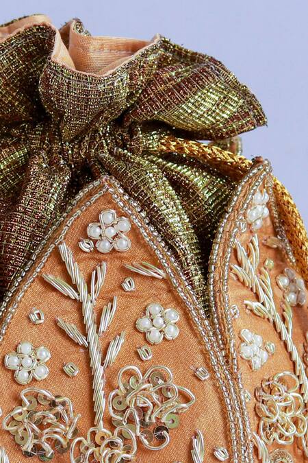 Shop The Tan Clan Gold Cut Work, Pearls, Zari Pushp Silk Hand Embroidered Potli Online at Aza Fashions Shop_The Tan Clan_Gold Cut Work, Pearls, Zari Pushp Silk Hand Embroidered Potli _Online_at_Aza_Fashions
