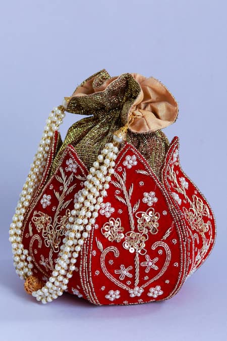 Shop The Tan Clan Red Zardozi Pushp Silk Lotus Embroidered Potli at Aza Fashions Shop_The Tan Clan_Red Zardozi Pushp Silk Lotus Embroidered Potli _at_Aza_Fashions