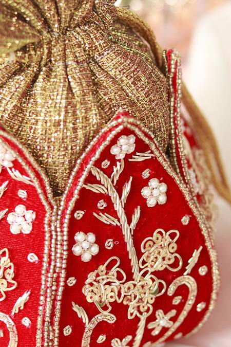 Shop The Tan Clan Red Zardozi Pushp Silk Lotus Embroidered Potli Online at Aza Fashions Shop_The Tan Clan_Red Zardozi Pushp Silk Lotus Embroidered Potli _Online_at_Aza_Fashions