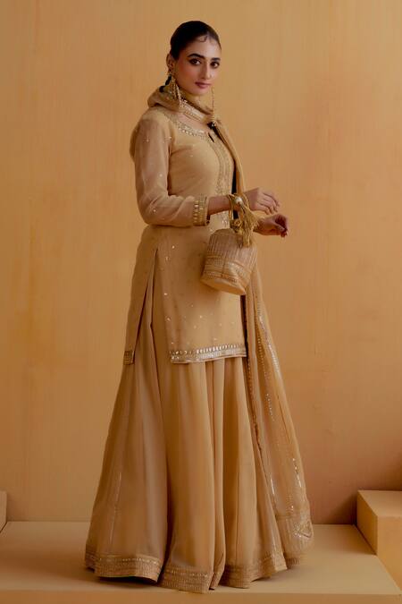 Buy Ranian Gold Georgette Embroidery, Gota Patti Round Neck Kurta Ghardar Lehenga Set Online at Aza Fashions Buy_Ranian_Gold Georgette Embroidery, Gota Patti Round Neck Kurta Ghardar Lehenga Set _Online_at_Aza_Fashions