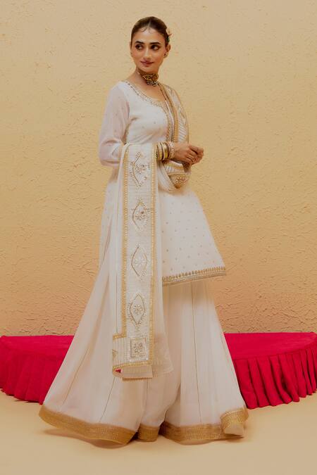 Shop Ranian White Georgette Gota Patti Round Neck Work Kurta Lehenga Set Online at Aza Fashions Shop_Ranian_White Georgette Gota Patti Round Neck Work Kurta Lehenga Set _Online_at_Aza_Fashions