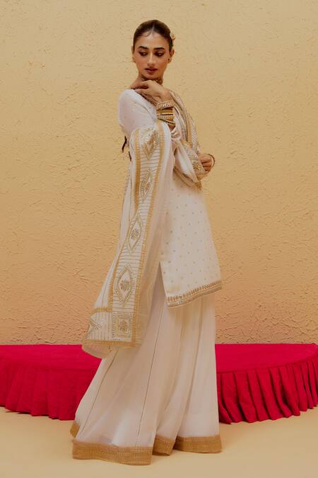 Ranian White Georgette Gota Patti Round Neck Work Kurta Lehenga Set at Aza Fashions Ranian_White Georgette Gota Patti Round Neck Work Kurta Lehenga Set _at_Aza_Fashions