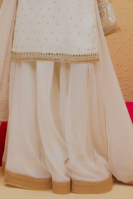 Buy Ranian White Georgette Gota Patti Round Neck Work Kurta Lehenga Set Buy_Ranian_White Georgette Gota Patti Round Neck Work Kurta Lehenga Set