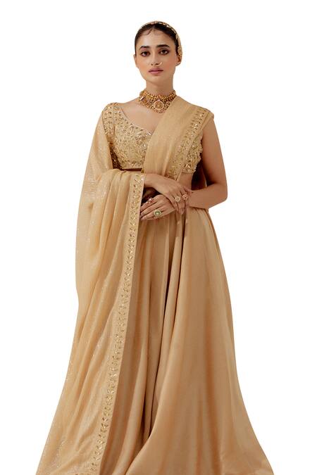 Shop Ranian Gold Silk Embroidery, Zari Asymmetric Zardosi Blouse Flared Lehenga Set Online at Aza Fashions Shop_Ranian_Gold Silk Embroidery, Zari Asymmetric Zardosi Blouse Flared Lehenga Set _Online_at_Aza_Fashions