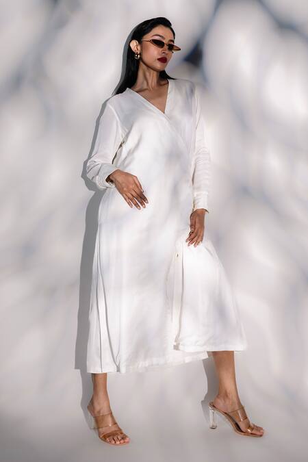 Karishma Kajaria_White Linen, Satin, Cotton V-neck Solid A-line Midi Dress _at_Aza_Fashions