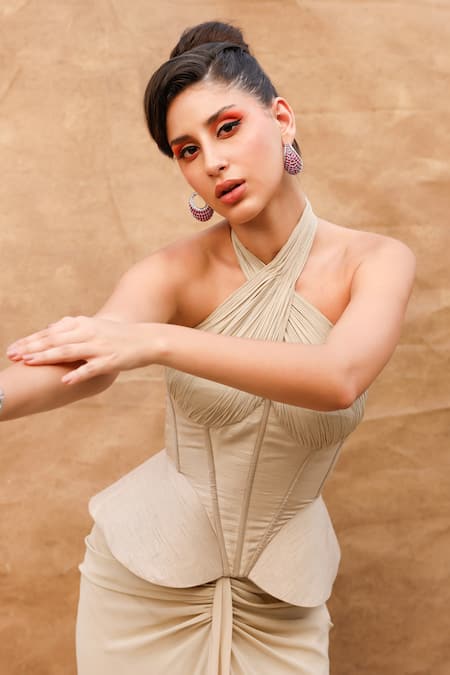 Anshika Tak Label_Beige Tussar, Georgette Halter Neck Corset Blouse And Draped Skirt Set _at_Aza_Fashions