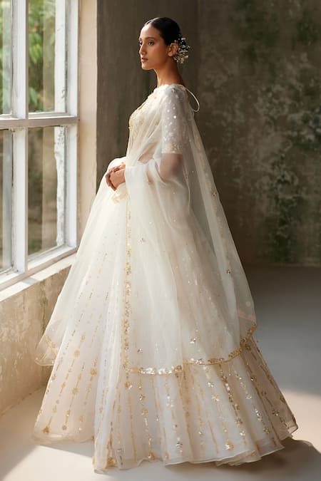 Buy_Zoon_Ivory Net, Crepe, Silk Organza Sequins, Embroidery Aari Hand Skirt Blouse Set 