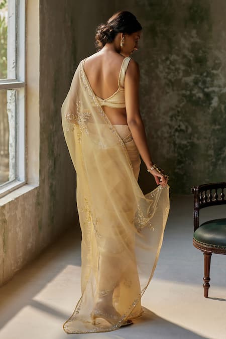 Shop Zoon Gold Organza, Embroidery Plunge Floral Placement Saree With Blouse at Aza Fashions Shop_Zoon_Gold Organza, Embroidery Plunge Floral Placement Saree With Blouse _at_Aza_Fashions