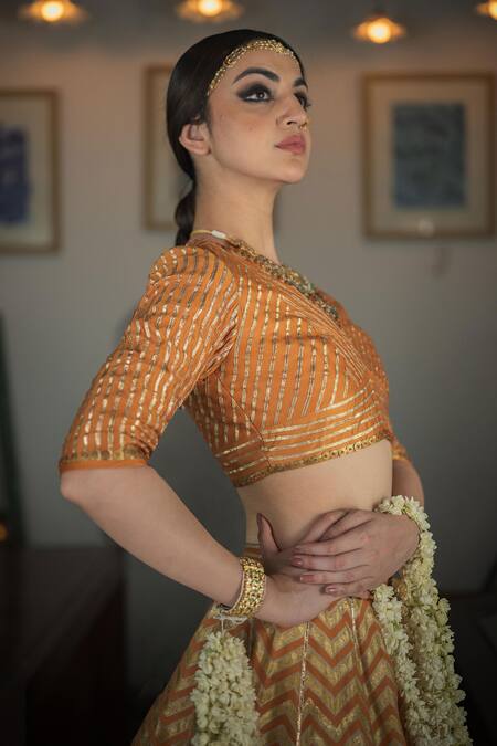 Swatti Kapoor Orange Handwoven 60gm Chanderi Embroidered Gota V Neck Anand Hand Saree Blouse at Aza Fashions Swatti Kapoor_Orange Handwoven 60gm Chanderi Embroidered Gota V Neck Anand Hand Saree Blouse _at_Aza_Fashions