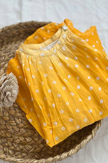 Shop Love The World Today Yellow 100% Cotton Hand Dyed Bandhani Kin Halter Neck Sunkissed Ombre Dress at Aza Fashions Shop_Love The World Today_Yellow 100% Cotton Hand Dyed Bandhani Kin Halter Neck Sunkissed Ombre Dress_at_Aza_Fashions