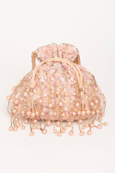 Shop Eena Rose Gold Crystals, Pearls, Beads, Stones And Tasseled Potli Bag at Aza Fashions Shop_Eena_Rose Gold Crystals, Pearls, Beads, Stones And Tasseled Potli Bag_at_Aza_Fashions