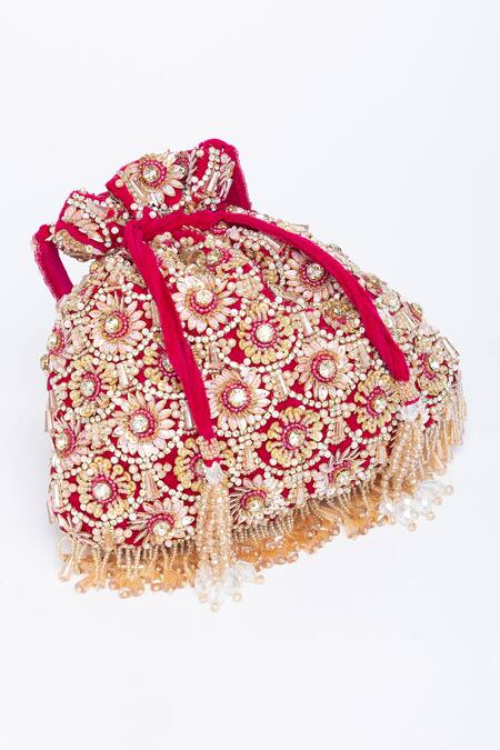 Shop_Eena_Magenta Tassels Oishi Velvet Floral Work Potli Bag _Online_at_Aza_Fashions