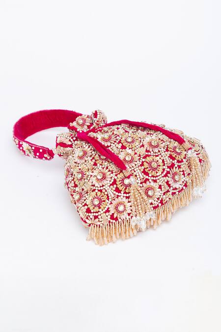 Eena_Magenta Tassels Oishi Velvet Floral Work Potli Bag _at_Aza_Fashions