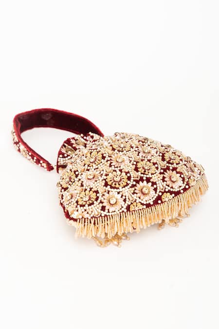 Eena Red Tassels Oishi Floral Embroidered Potli Bag at Aza Fashions Eena_Red Tassels Oishi Floral Embroidered Potli Bag _at_Aza_Fashions