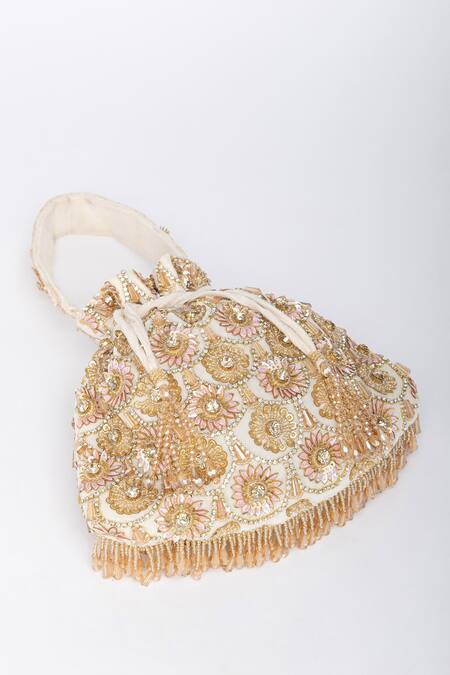 Eena White Crystals, Tassels Oishi Velvet Embroidered Potli Bag at Aza Fashions Eena_White Crystals, Tassels Oishi Velvet Embroidered Potli Bag _at_Aza_Fashions