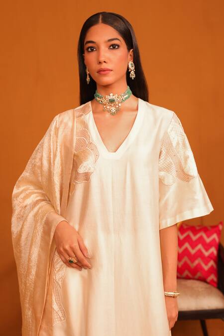 Shop Omana By Ranjana Bothra Beige Cotton Satin, Crepe Applique, Embroidery V-neck Floral Kurta Trouser Set Online at Aza Fashions Shop_Omana By Ranjana Bothra_Beige Cotton Satin, Crepe Applique, Embroidery V-neck Floral Kurta Trouser Set _Online_at_Aza_Fashions