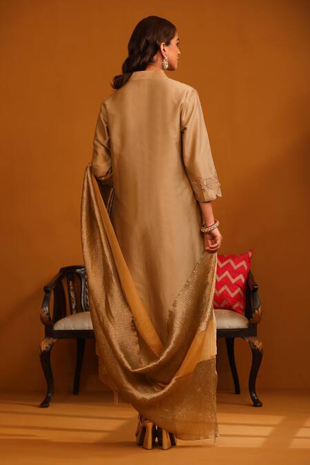 Shop Omana By Ranjana Bothra Beige Cotton Satin, Crepe Applique V-neck Floral Kurta Trouser Set at Aza Fashions Shop_Omana By Ranjana Bothra_Beige Cotton Satin, Crepe Applique V-neck Floral Kurta Trouser Set _at_Aza_Fashions