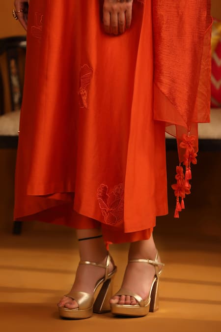 Omana By Ranjana Bothra_Orange Cotton Satin, Silk Applique, Tassels Round Floral Kurta Trouser Set _at_Aza_Fashions
