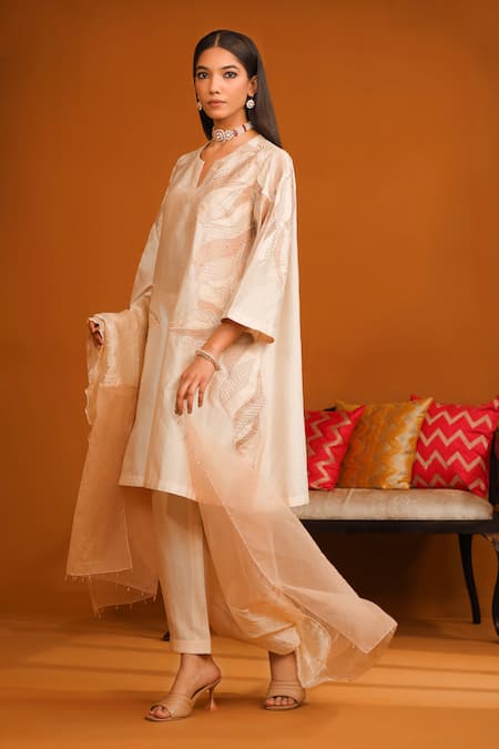 Buy Omana By Ranjana Bothra Ivory Cotton Satin, Crepe Applique, Beads Split V-neck Floral Kurta Trouser Set Online at Aza Fashions Buy_Omana By Ranjana Bothra_Ivory Cotton Satin, Crepe Applique, Beads Split V-neck Floral Kurta Trouser Set _Online_at_Aza_Fashions