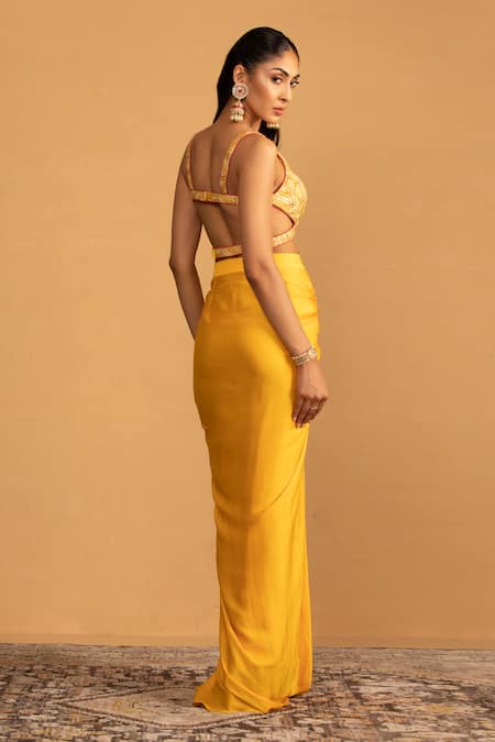 Shop Esha Koul Yellow Georgette, Satin Gota Patti Embroidered Blouse With Draped Dhoti Skirt at Aza Fashions Shop_Esha Koul_Yellow Georgette, Satin Gota Patti Embroidered Blouse With Draped Dhoti Skirt _at_Aza_Fashions