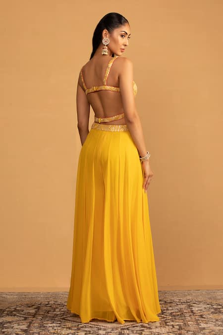 Shop Esha Koul Yellow Net, Georgette Gota Patti Asymmetric Embroidered Blouse And Palazzo Set at Aza Fashions Shop_Esha Koul_Yellow Net, Georgette Gota Patti Asymmetric Embroidered Blouse And Palazzo Set _at_Aza_Fashions