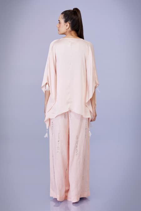 Shop Dilnaz Peach Blended Satin Linen Embroidery Sequin Snowflake Flared Trouser at Aza Fashions Shop_Dilnaz_Peach Blended Satin Linen Embroidery Sequin Snowflake Flared Trouser_at_Aza_Fashions