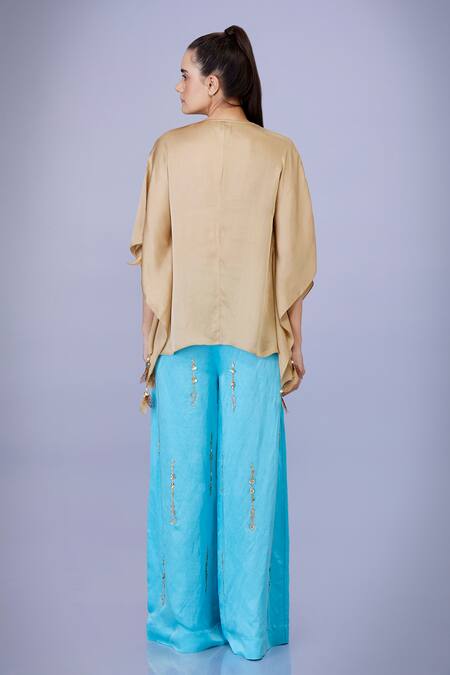 Shop Dilnaz Gold Blended Satin Plain V Neck Tassel Embellished Draped Kaftan at Aza Fashions Shop_Dilnaz_Gold Blended Satin Plain V Neck Tassel Embellished Draped Kaftan_at_Aza_Fashions