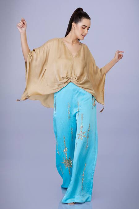 Dilnaz Gold Blended Satin Plain V Neck Tassel Embellished Draped Kaftan at Aza Fashions Dilnaz_Gold Blended Satin Plain V Neck Tassel Embellished Draped Kaftan_at_Aza_Fashions