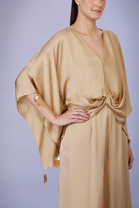 Dilnaz Gold Blended Satin Plain V Neck Tassel Work Kaftan With Jumpsuit Online at Aza Fashions Dilnaz_Gold Blended Satin Plain V Neck Tassel Work Kaftan With Jumpsuit_Online_at_Aza_Fashions
