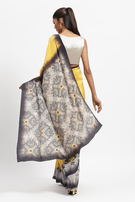 Shop Satya Paul Yellow Silk Satin Floral Border Print Saree With Running Blouse at Aza Fashions Shop_Satya Paul_Yellow Silk Satin Floral Border Print Saree With Running Blouse _at_Aza_Fashions