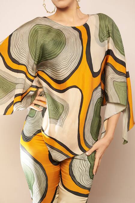 Babita Malkani_Ivory Satin Round Neck Ripple Dream Print Poncho Top _Online_at_Aza_Fashions