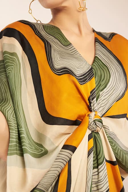 Babita Malkani_Ivory Satin V-neck Ripple Dream Print Knotted Kaftan _Online_at_Aza_Fashions