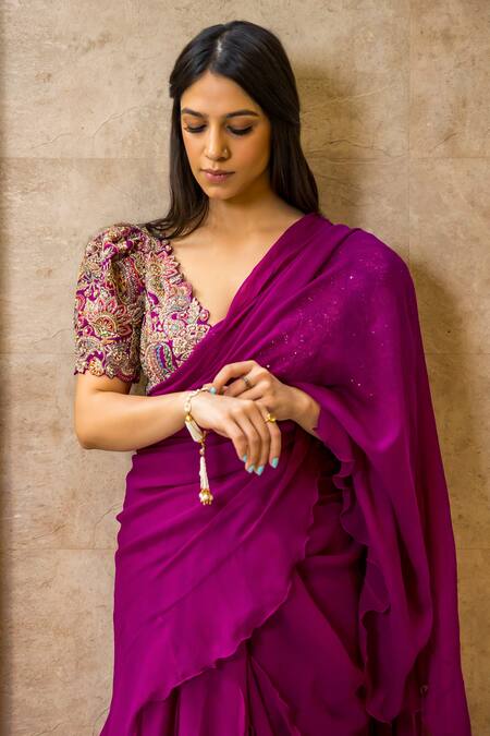 Buy Mrunalini Rao Magenta Chiffon, Silk Zari, Embroidery V-neck Ruffle Saree With Floral Blouse Buy_Mrunalini Rao_Magenta Chiffon, Silk Zari, Embroidery V-neck Ruffle Saree With Floral Blouse