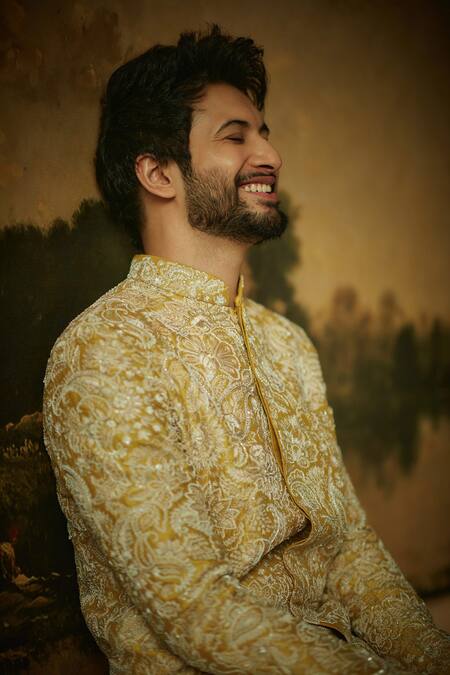 Mrunalini Rao Yellow Silk Embroidery Nevan Resham Sherwani Set at Aza Fashions Mrunalini Rao_Yellow Silk Embroidery Nevan Resham Sherwani Set _at_Aza_Fashions