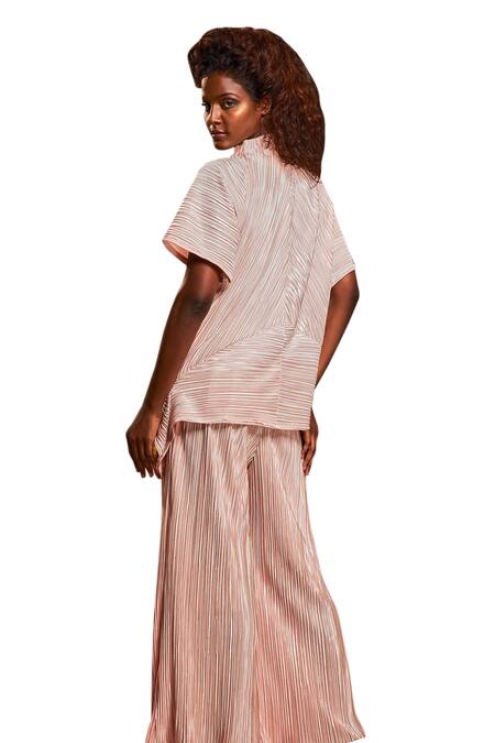 Echke Peach Silk, Lurex V-neck Metallic Pleated Asymmetric Top And Pant Set at Aza Fashions Echke_Peach Silk, Lurex V-neck Metallic Pleated Asymmetric Top And Pant Set _at_Aza_Fashions