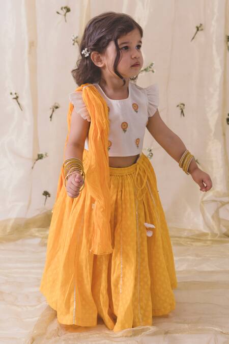 Buy Tiber Taber Yellow Chanderi Cotton, Silk Tassels, Embroidery Flower Lehenga Set Buy_Tiber Taber_Yellow Chanderi Cotton, Silk Tassels, Embroidery Flower Lehenga Set