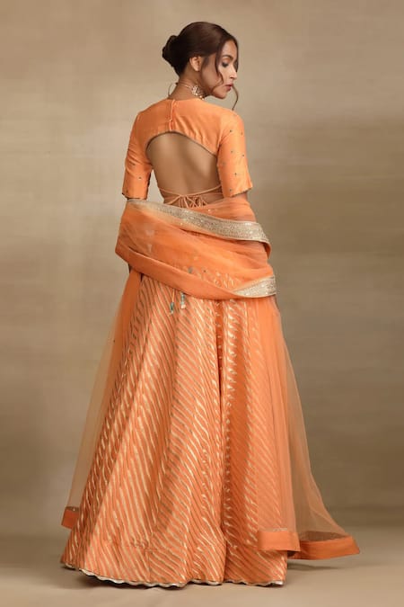 Shop Trendy Tokari Peach Georgette, Silk Mirrors, Sequins, Diamonds Leher Wave Woven Lehenga Set at Aza Fashions Shop_Trendy Tokari_Peach Georgette, Silk Mirrors, Sequins, Diamonds Leher Wave Woven Lehenga Set _at_Aza_Fashions