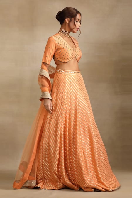Buy Trendy Tokari Peach Georgette, Silk Mirrors, Sequins, Diamonds Leher Wave Woven Lehenga Set Online at Aza Fashions Buy_Trendy Tokari_Peach Georgette, Silk Mirrors, Sequins, Diamonds Leher Wave Woven Lehenga Set _Online_at_Aza_Fashions