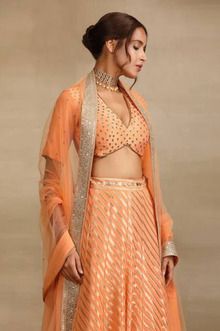 Shop Trendy Tokari Peach Georgette, Silk Mirrors, Sequins, Diamonds Leher Wave Woven Lehenga Set Online at Aza Fashions Shop_Trendy Tokari_Peach Georgette, Silk Mirrors, Sequins, Diamonds Leher Wave Woven Lehenga Set _Online_at_Aza_Fashions