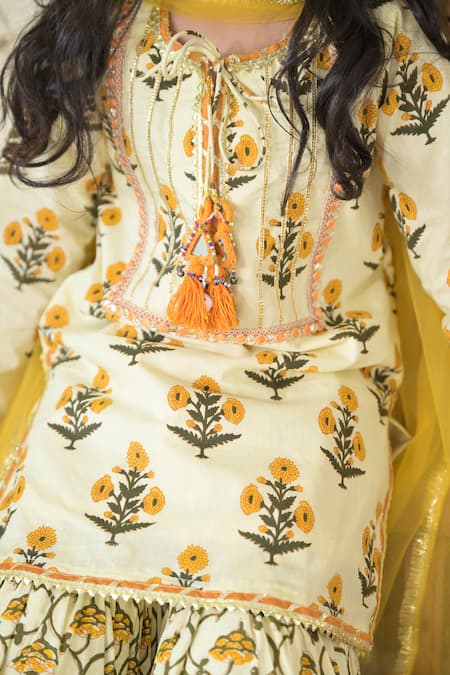 The Plum Bum_Yellow Cotton, Net Tassels, Gota Patti Floral Pattern Kurta Sharara Set_at_Aza_Fashions