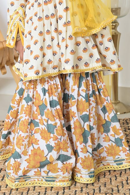 The Plum Bum Yellow Cotton, Net Lace, Embroidery Floral Hand Block Print Kurta Sharara Set at Aza Fashions The Plum Bum_Yellow Cotton, Net Lace, Embroidery Floral Hand Block Print Kurta Sharara Set _at_Aza_Fashions