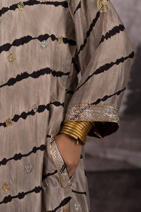 Bhusattva_Gold Cotton, Silk Embroidery V-neck Nakshi Motif Leheriya Kurta Pant Set _Online_at_Aza_Fashions