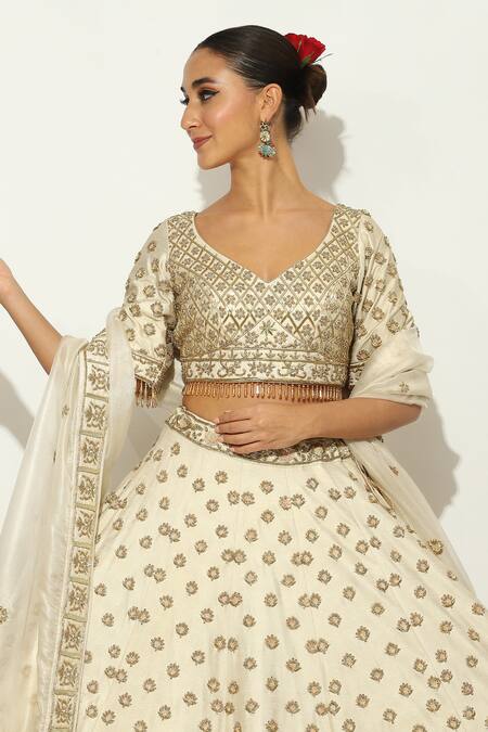 Shop Vandana Sethi Ivory Silk Beads, Tassels, Embroidery Padma Bagh Zardozi Bridal Lehenga Set Online at Aza Fashions Shop_Vandana Sethi_Ivory Silk Beads, Tassels, Embroidery Padma Bagh Zardozi Bridal Lehenga Set _Online_at_Aza_Fashions
