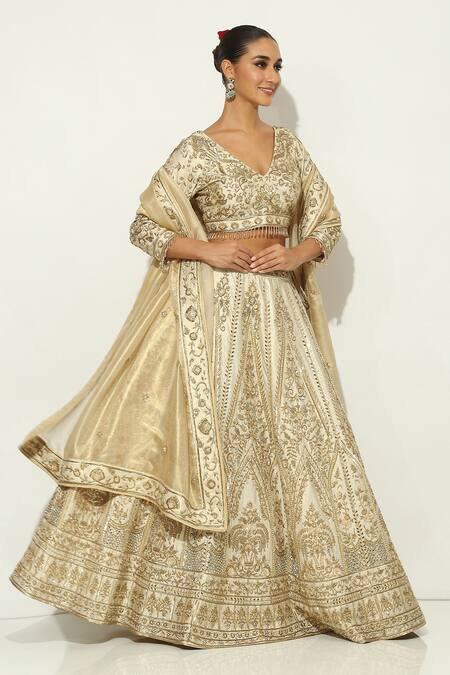 Shop Vandana Sethi Ivory Silk Tassels V-neck Shimmer Raw Oriental Zardosi Embroidered Lehenga Set Online at Aza Fashions Shop_Vandana Sethi_Ivory Silk Tassels V-neck Shimmer Raw Oriental Zardosi Embroidered Lehenga Set _Online_at_Aza_Fashions