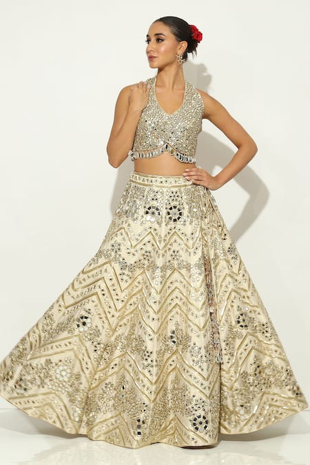 Shop Vandana Sethi Gold Silk Crystals, Beads, Mirrors Halter Neck Floral Embellished Lehenga Set Online at Aza Fashions Shop_Vandana Sethi_Gold Silk Crystals, Beads, Mirrors Halter Neck Floral Embellished Lehenga Set _Online_at_Aza_Fashions