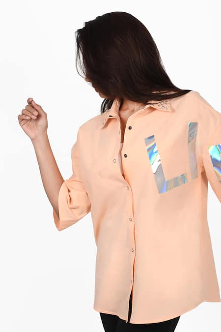 Shop Richaa Goenka Peach Cotton Print Text Collared Neck Holographic Life Shirt at Aza Fashions Shop_Richaa Goenka_Peach Cotton Print Text Collared Neck Holographic Life Shirt _at_Aza_Fashions